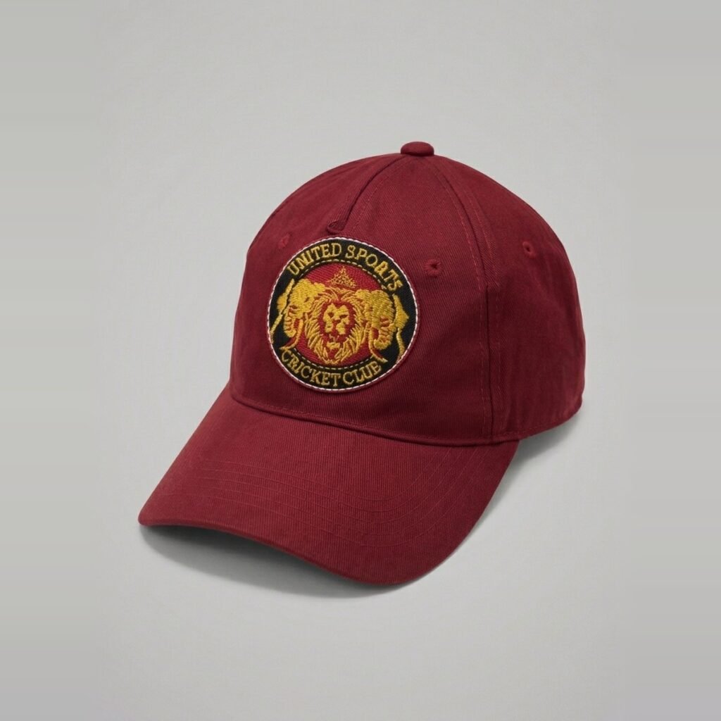 United Sports Cricket Club cap in club maroon with embroidered crest